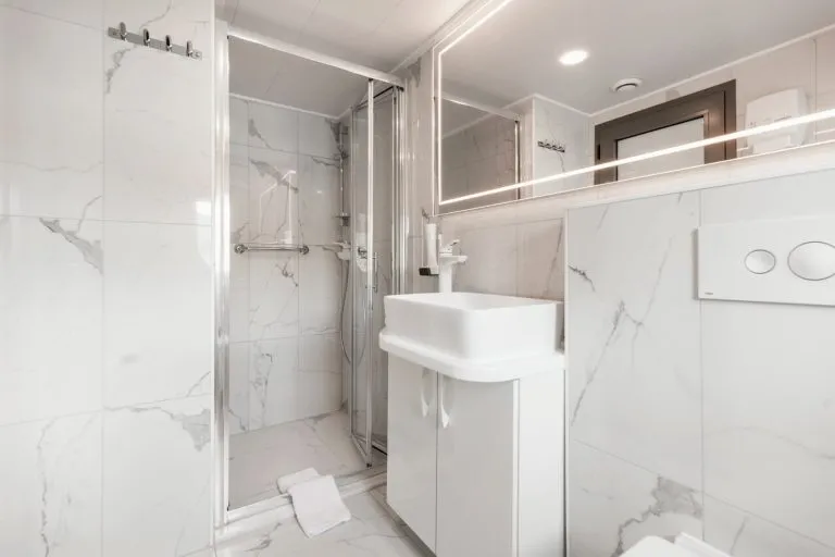 Bathroom sink and shower on yacht