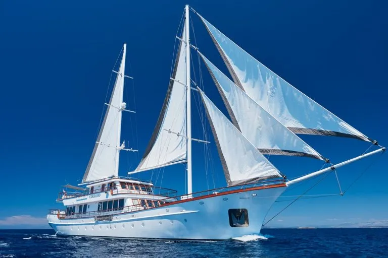 Corsario sails on white boat