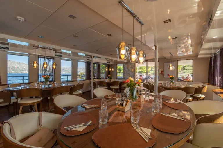 Tables and chairs on yolo yacht
