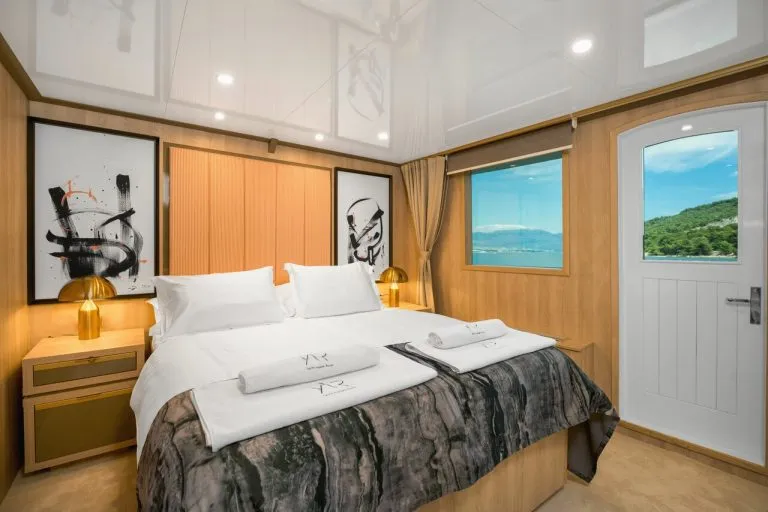 White bed on agape rose yacht