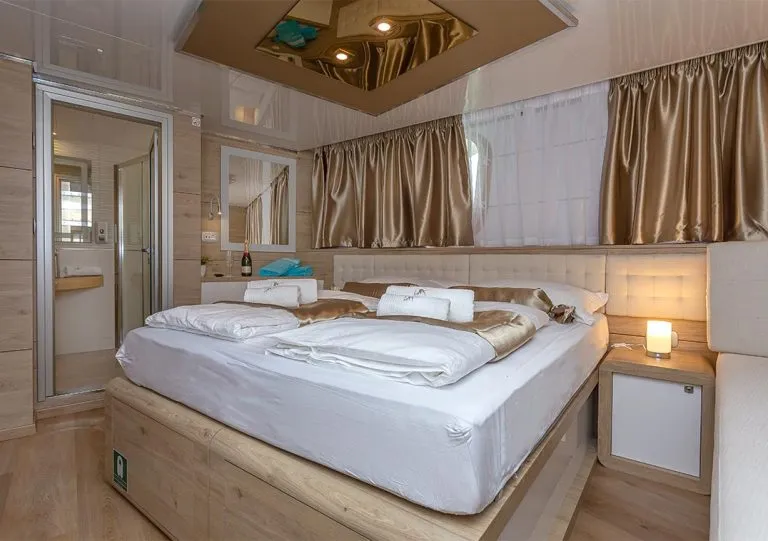 White bed on swallow yacht